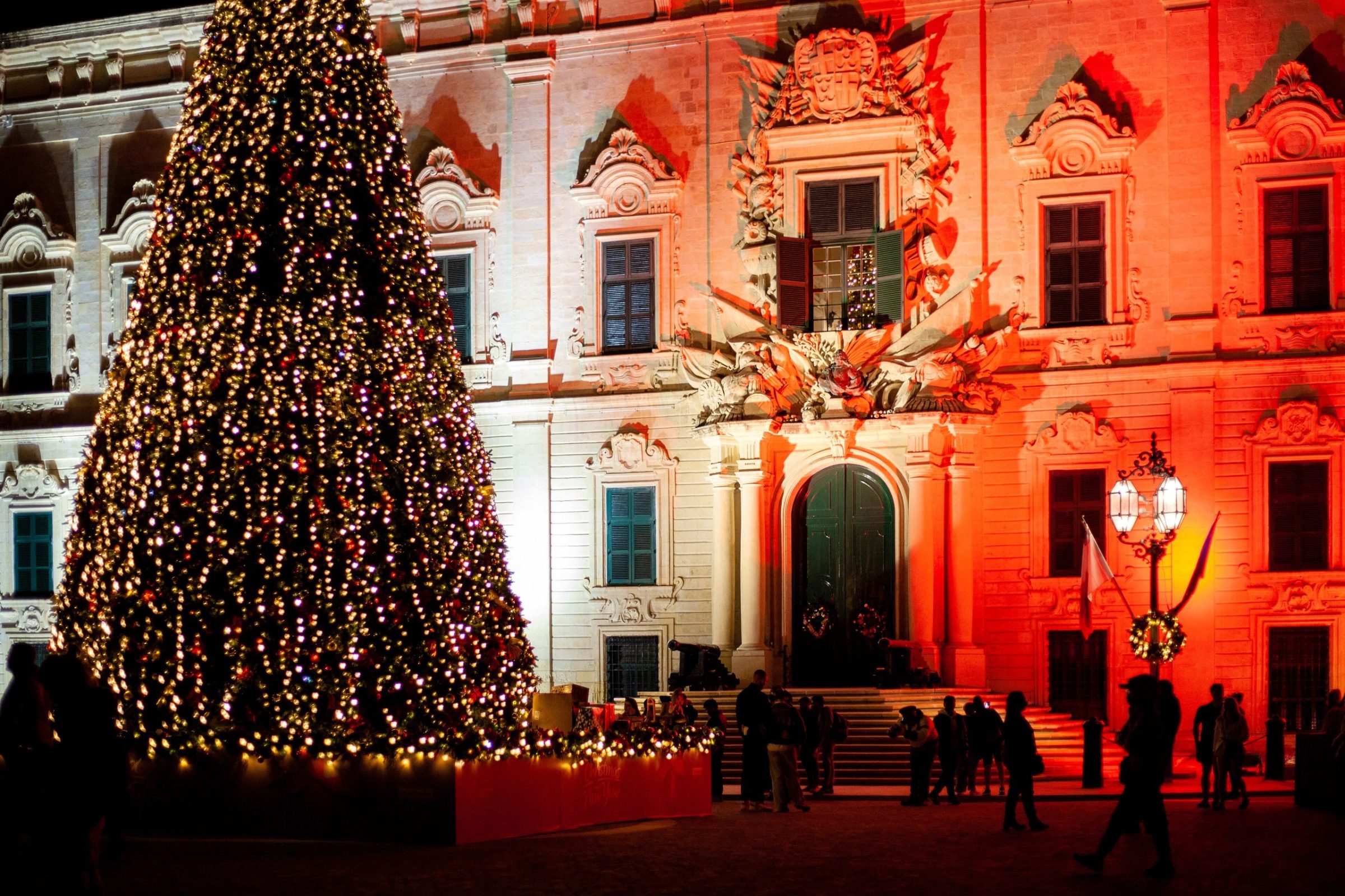 The Christmas tree lit up in front of the Auberge de Castille in Valletta